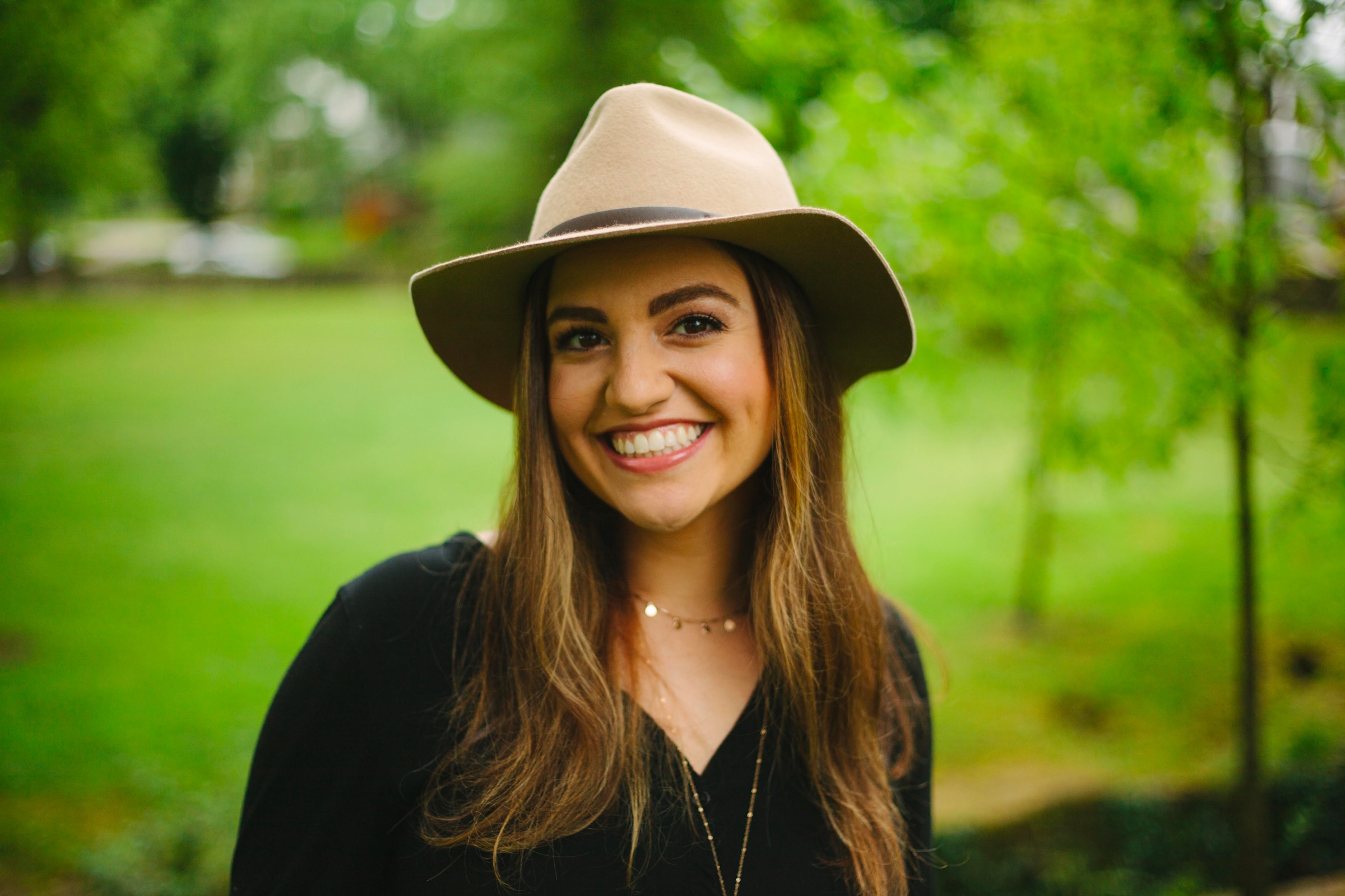 Rebecca gray headshot hat - voice lessons tips & tricks blog 2