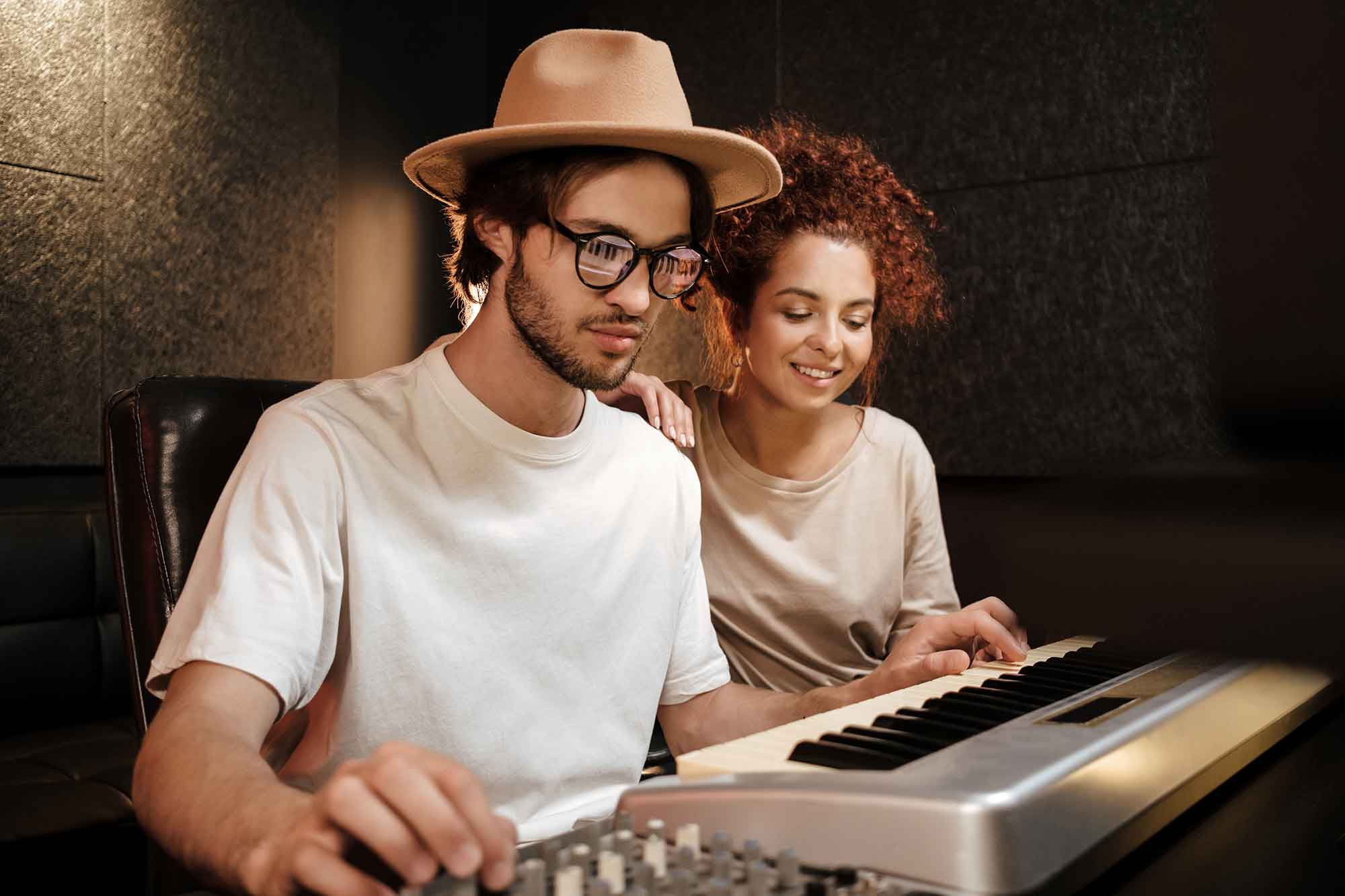 Songwriting young stylish musicians happily recording new song - voice lessons tips & tricks blog 1